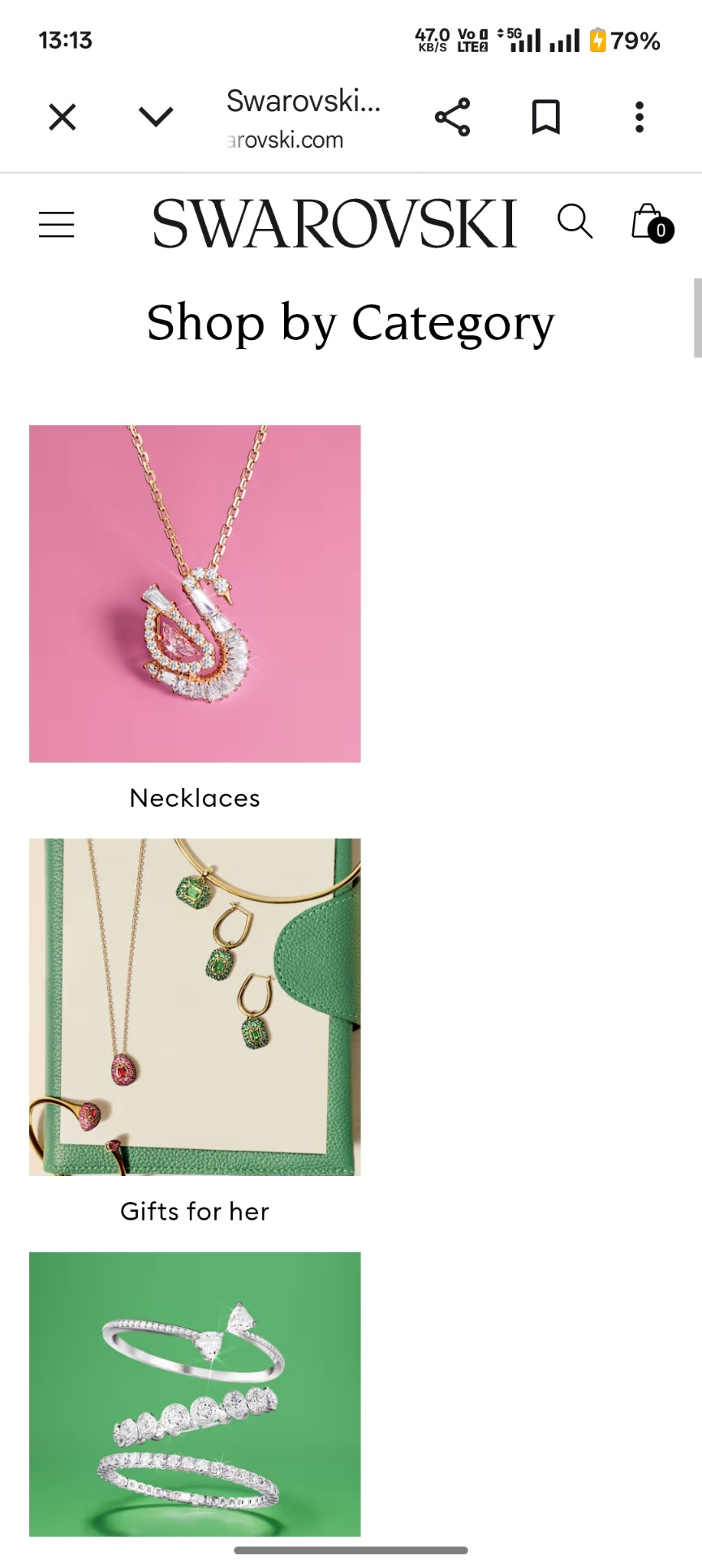 Swarovski mobile homepage showing the 'Shop by Category' section with large image tiles for Necklaces, Gifts for Her, and Bracelets